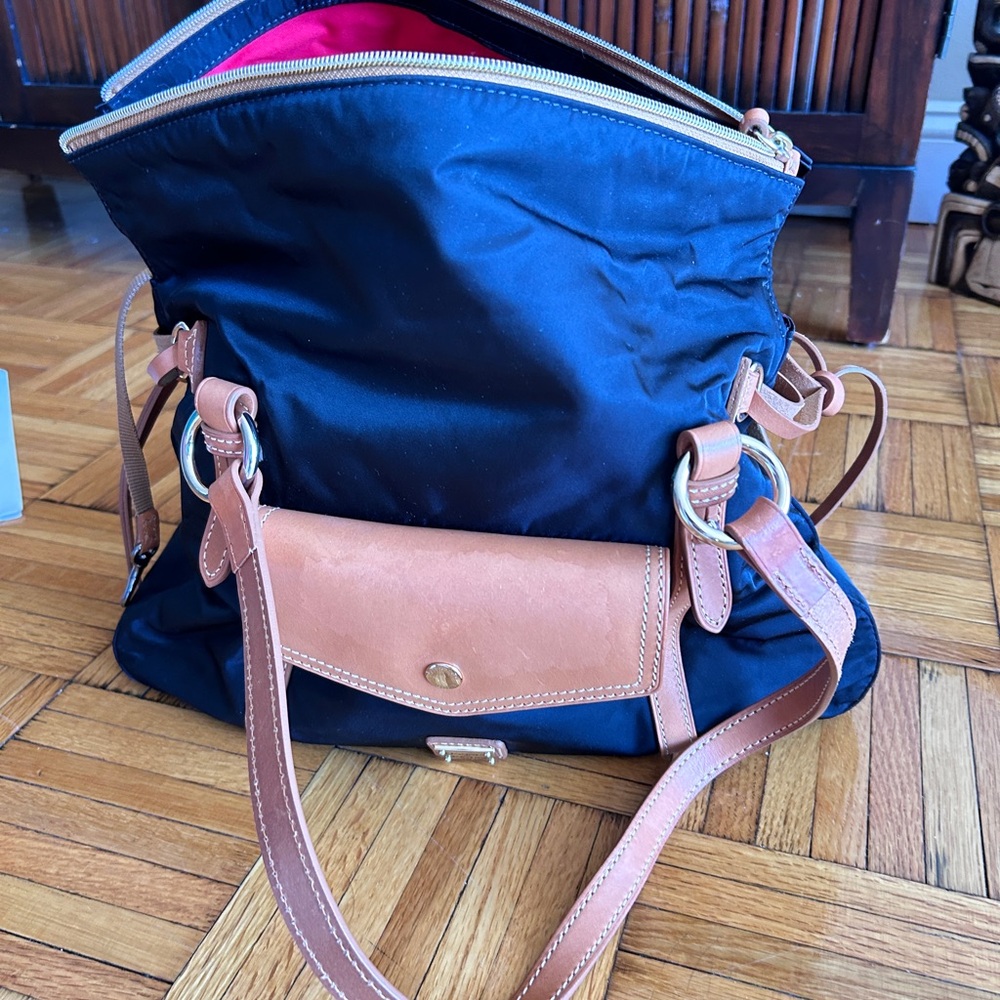 Dooney&Bourke Black nylon and leather shoulder bag .